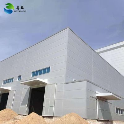 مجموعات بناء ورشة عمل هيكل فولاذي مسبق الصنع متعدد الطوابق مع سقف وألواح جدارية من الألواح العازلة وباب منزلق